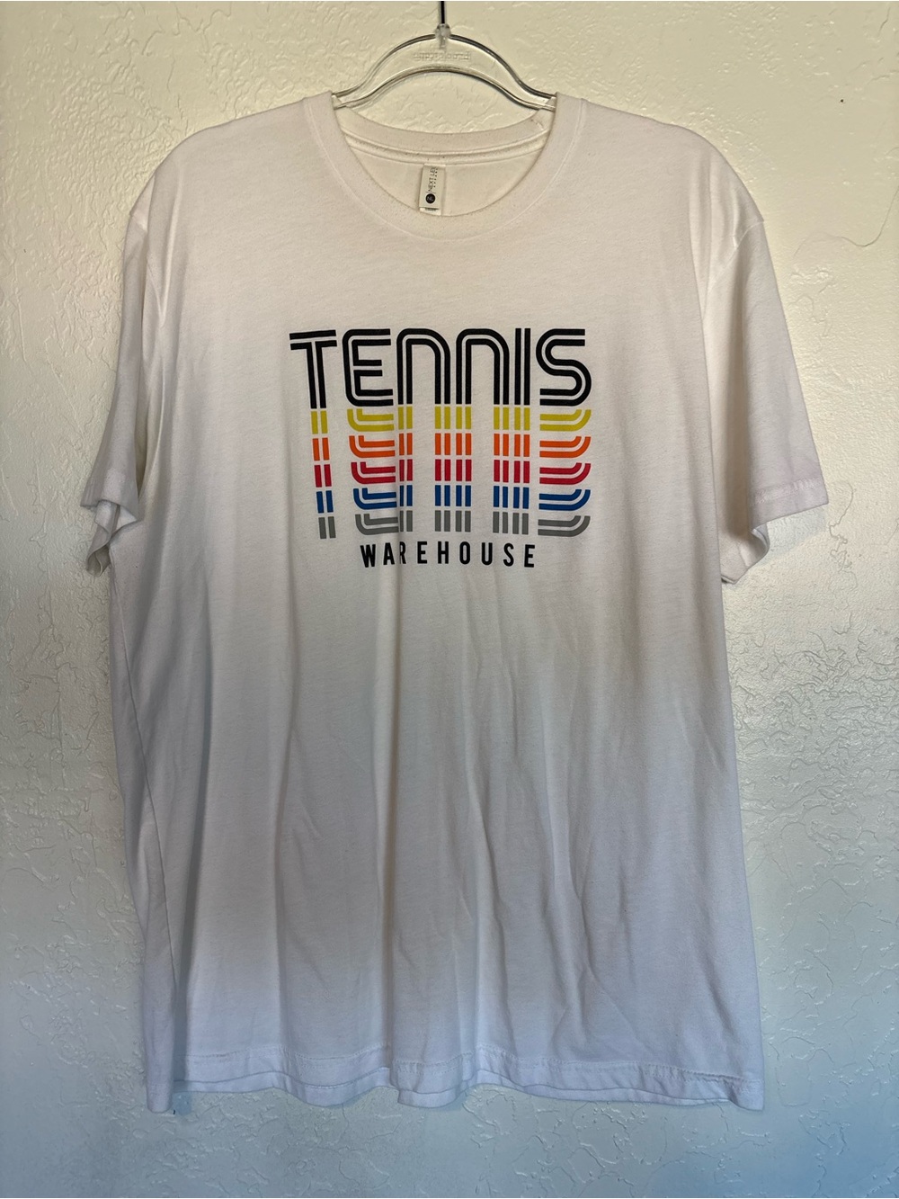 Next Level Apparel White Tee with Multicolor Tennis Graphic